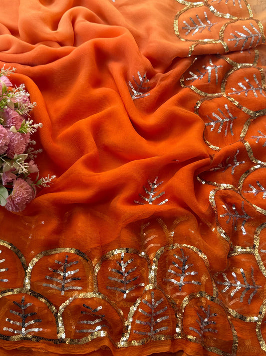 Orange shaded sequins border saree