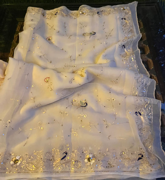 Off white peacock jaal saree