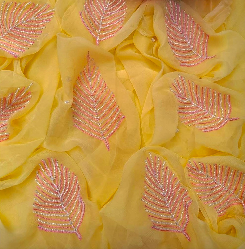 Yellow pearl motif saree
