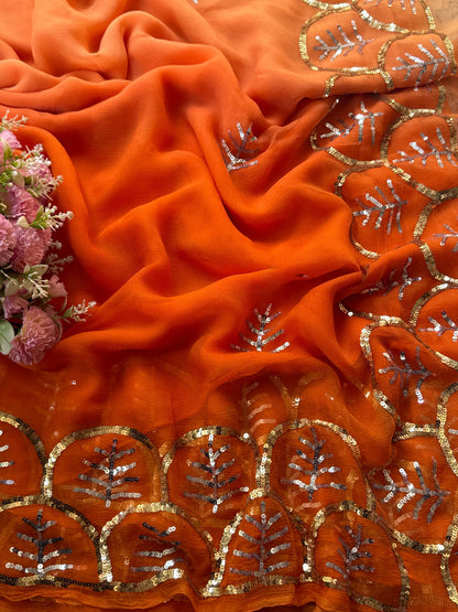Orange shaded sequins border saree